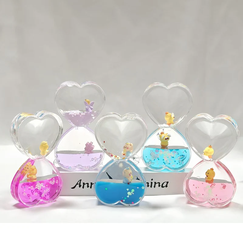 Hjerteformet flydende timeglas ornament